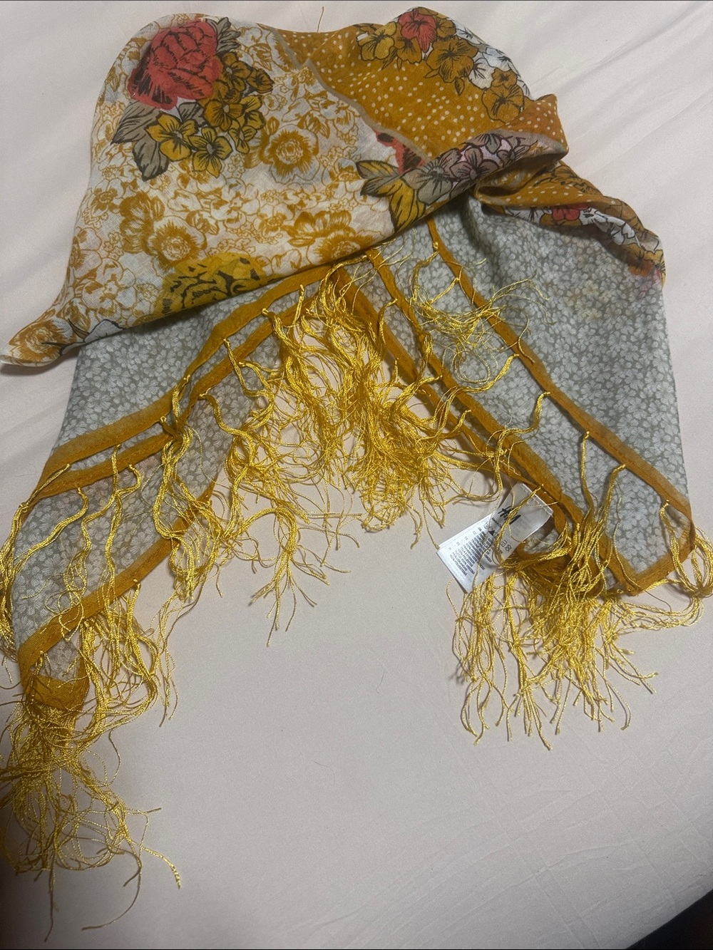 H&M Gold fringed scarf. Beautiful Gold Flowered Pattern